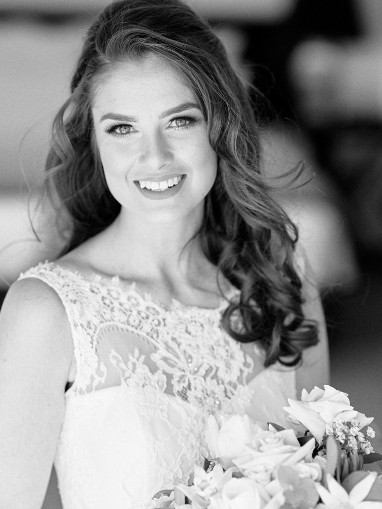 Black and white portrait of bride with hair and makeup done